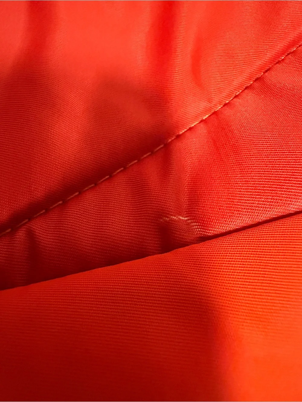 STATE Bags Kane kids backpack in an orange chevron puffer style
